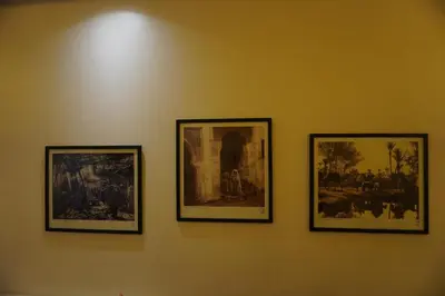 three framed pictures hanging on a wall at Comfort Appartment Centre Marrakech in Marrakech