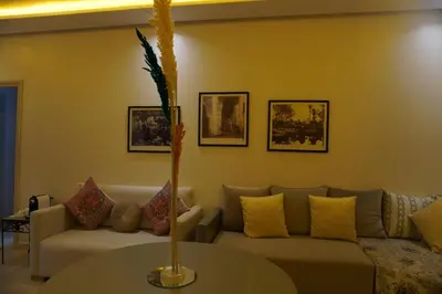 a living room with a couch and a table at Comfort Appartment Centre Marrakech in Marrakech