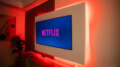 a television with a netflix sign on a wall at Yasmine Majorelle Residence Apartment in Marrakech
