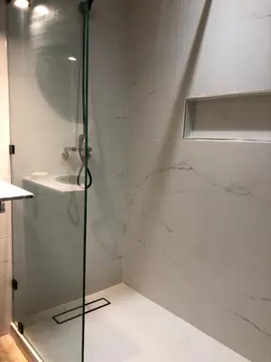 a bathroom with a shower and a sink at Résidence Atlas Golf Marrakech in Marrakech