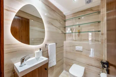 a bathroom with a sink and a mirror at Stylish Apartment with Balcony view & Free Parking in Marrakech