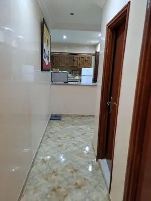 a room with a counter and a tile floor at Happy space in Marrakech