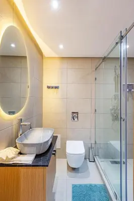 a bathroom with a sink and a toilet and a shower at 10 min from Stadium AFCON Green Table Loft in Marrakech