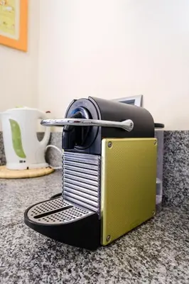a toaster sitting on top of a counter at Prestigia Appartment Golf & 3 Pools in Marrakech