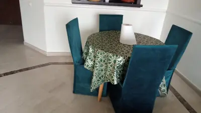 a table and chairs with a table cloth on it at Marrakech garden lilla in Marrakech