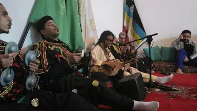 a group of men sitting in a room with instruments at Proworkshop in Marrakech