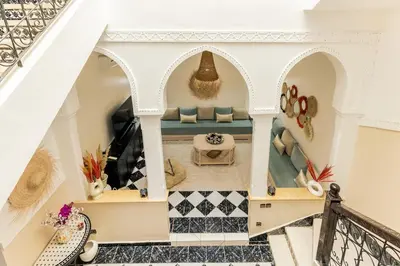 a view of a living room from the top floor of a house at Riad Qarya Petit-déjeuner et transfert inclus in Marrakech