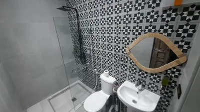 a bathroom with a sink and a mirror at Hotel & Riad Celia in Marrakech