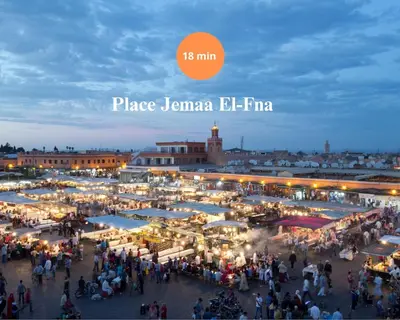 a crowd of people walking around a market at night at Inside A Mood - Marrakech in Marrakech