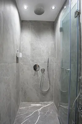 a bathroom with a shower with a glass door at A Spot With No Rush - Marrakech in Marrakech
