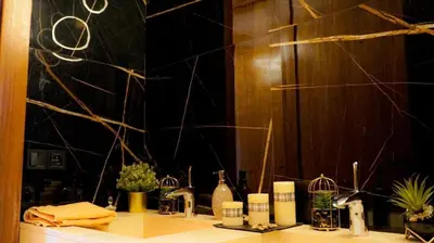 a bathroom counter with a mirror and a sink at villa argana golf in Marrakech