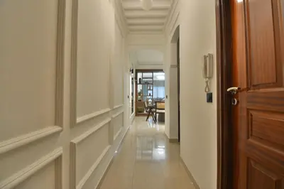 a hallway with a door and a room with a hallwayngth at L'adresse- Appartement 4p au centre de Marrakech in Marrakech