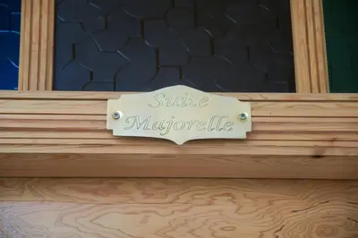 a sign that reads sunrise margarite on a wooden table at Riad el fassi & spa charme authentique piscine chauffée in Marrakech