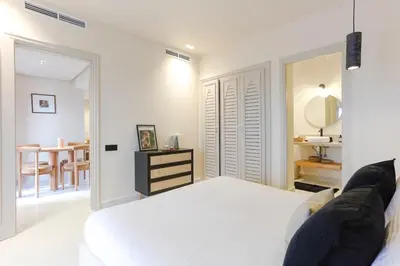 a bedroom with a bed and a mirror and a table at Your Unique Stay - Marrakech Place To Be in Marrakech