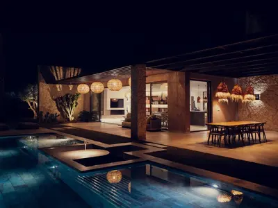 a house with a swimming pool at night at LA VILLA 58 - Ecolodge - Marrakech in Marrakech