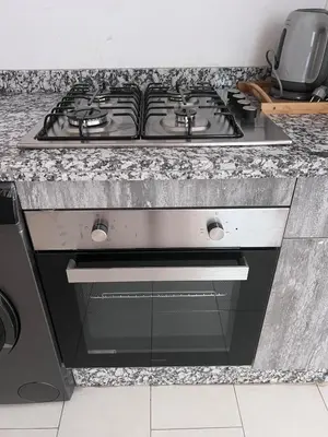 a stove top oven sitting in a kitchen at Modern quiet studio Close to Guéliz in Marrakech