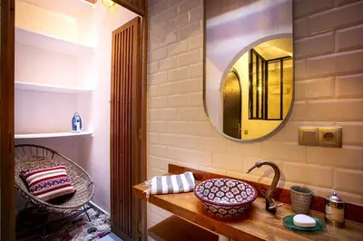 a bathroom with a sink and a mirror at Loft house Marrakech in Marrakech