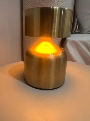 a metal candle sitting on top of a table at Appartement cosy près de Gueliz in Marrakech