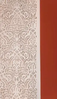 a wall with a white stenciled pattern on it at Penthouse city center sdfghjhgfdsdfghjhgfdsdfghjhgfds in Marrakech