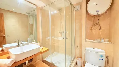 a bathroom with a shower and a sink and a toilet at Chic Stay in Gueliz 4 Free Parking Netflix in Marrakech