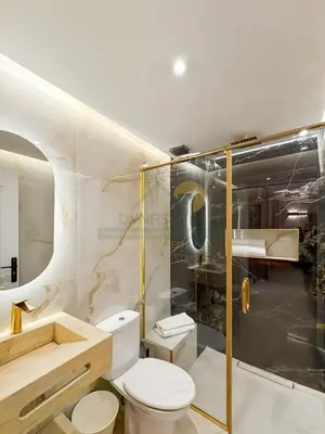 a bathroom with a toilet and a shower at Appartement neuf et chic Proche gare et CTM in Marrakech