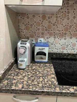 two toasters sitting on a counter in a kitchen at Location Centrale - Heated 1BR - Parking - Netflix in Marrakech