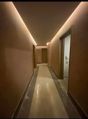 an empty hallway in a building with a hallway at Guéliz 5 min away - Quiet - Pool & Parking in Marrakech