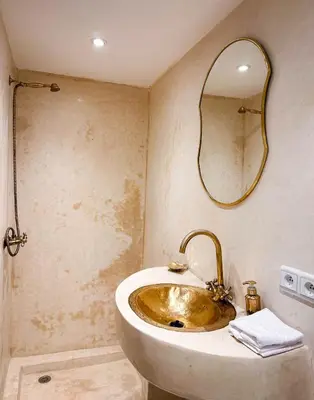 a bathroom with a sink and a mirror at Riad Green Atlas in Marrakech