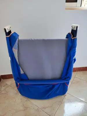 a blue bag sitting on the floor next to a wall at Cocon calme et confortable wifi Netflix Gueliz Daoudiate in Marrakech