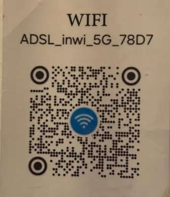a box with a picture of a cpu with a blue dot at Appartement near to big square in Marrakech