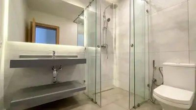 a bathroom with a sink and a toilet at Villa JAMAL with heated pool in Marrakech in Marrakech