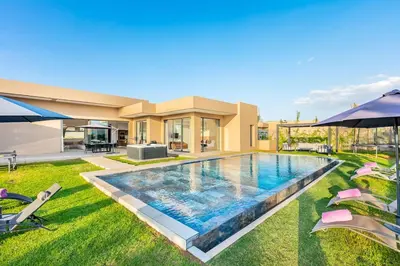a swimming pool in the backyard of a house at Heated Pool Absolute Luxury in Marrakech