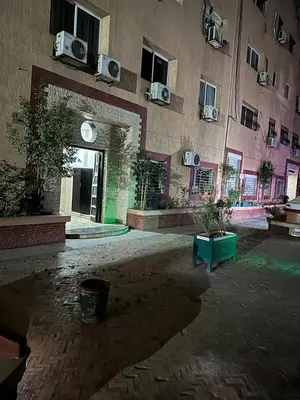 an empty parking lot in a building with a building at Au Cœur de L'hivernage P09 in Marrakech