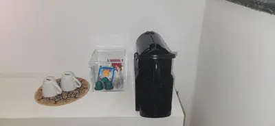 a black blender sitting on top of a counter at Appartement Serein 10 min jamaa el fnaaa in Marrakech