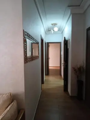 a hallway with a hallway leading into a room at Marrakech in Marrakech
