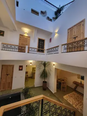 a view from the second floor of a house with a staircase at Riad in Marrakech