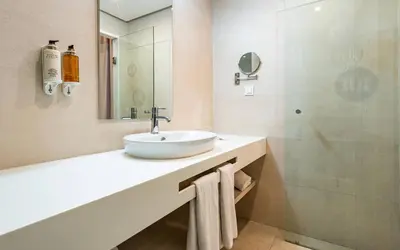a bathroom with a sink and a shower at TUI BLUE Medina Gardens - Adults Only - All Inclusive in Marrakech
