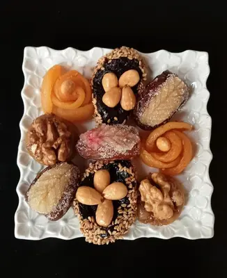 a plate filled with different types of donuts at Dar al Sultan in Marrakech