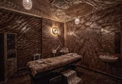 a bathroom with a sink and a vanity with a sink at Be Live Collection Marrakech Adults Only All inclusive in Marrakech