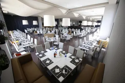 an overhead view of a banquet hall with tables and chairs at Kenzi Club Agdal Medina - All Inclusive in Marrakech