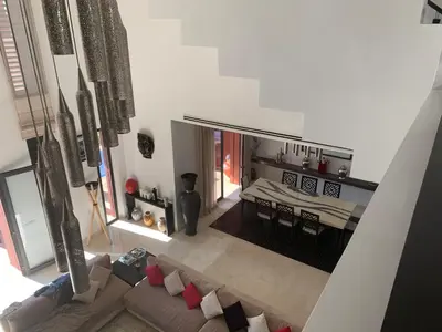 an overhead view of a living room with a couch at Villa Riad Al Maaden in Marrakech