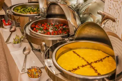 a bunch of food in a pot on a table at Riad Palais Des Princesses & Spa in Marrakech