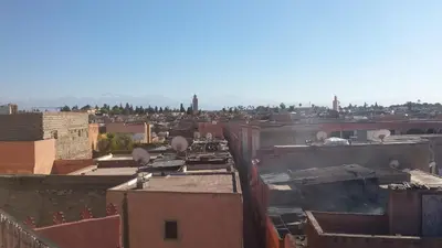 an aerial view of a city with buildings at Riad Tifor in Marrakech