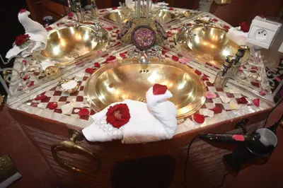 a group of three sinks in a bathroom at Riad Assalam in Marrakech
