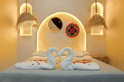 two white swansrendered to look like a bed at Riad El Kennaria in Marrakech