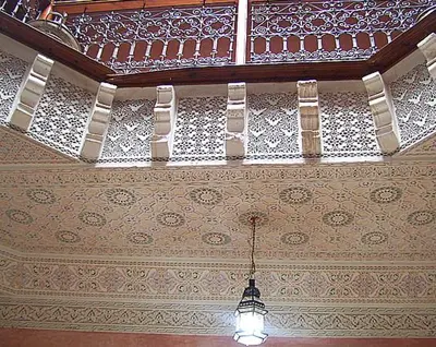 a chandelier hanging from a ceiling in a room at Riad Essaoussan in Marrakech
