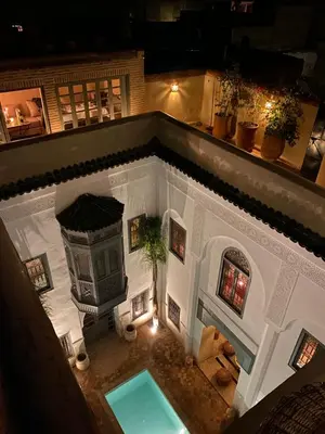 an overhead view of a house with a swimming pool at Riad Hadika Maria in Marrakech