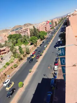 an aerial view of a city street with parked cars at Hotel El Hadna By HMS in Marrakech