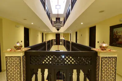 a view of a hallway of a building at Hotel El Hadna By HMS in Marrakech