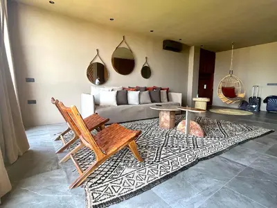 a living room with a couch and a table at Palais Souad in Marrakech